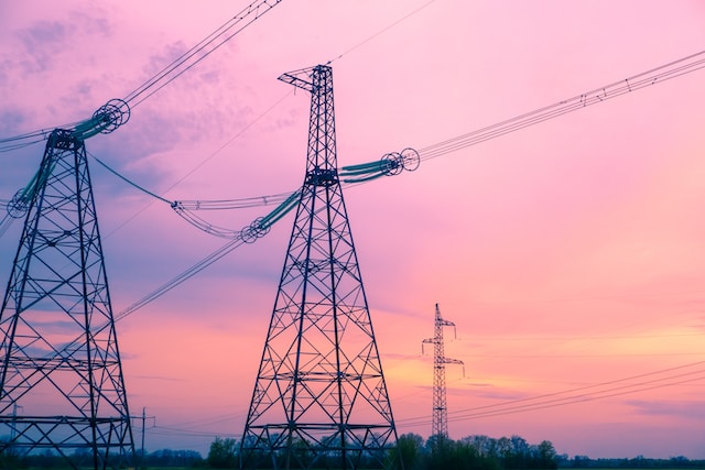 Electric transmission towers on a field