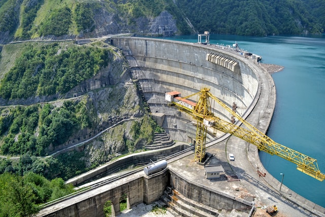Crane on top of a water dam during construction