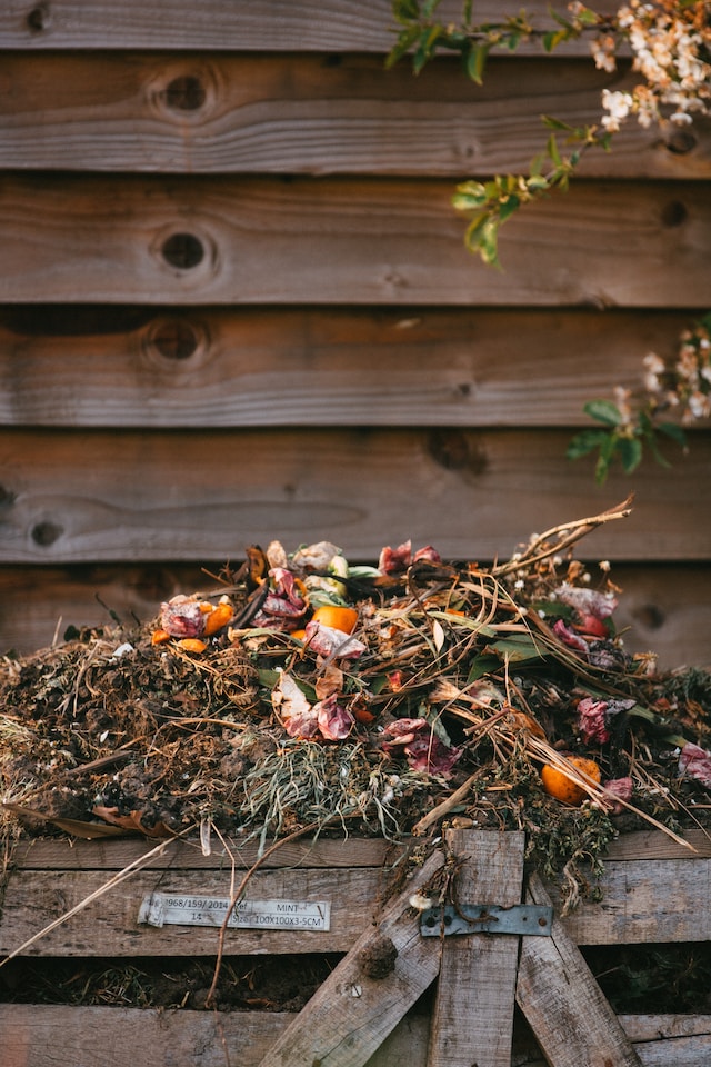 A heap of compost in the garden