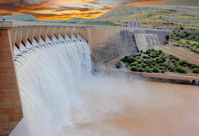 Cascading water flowing through a massive dam