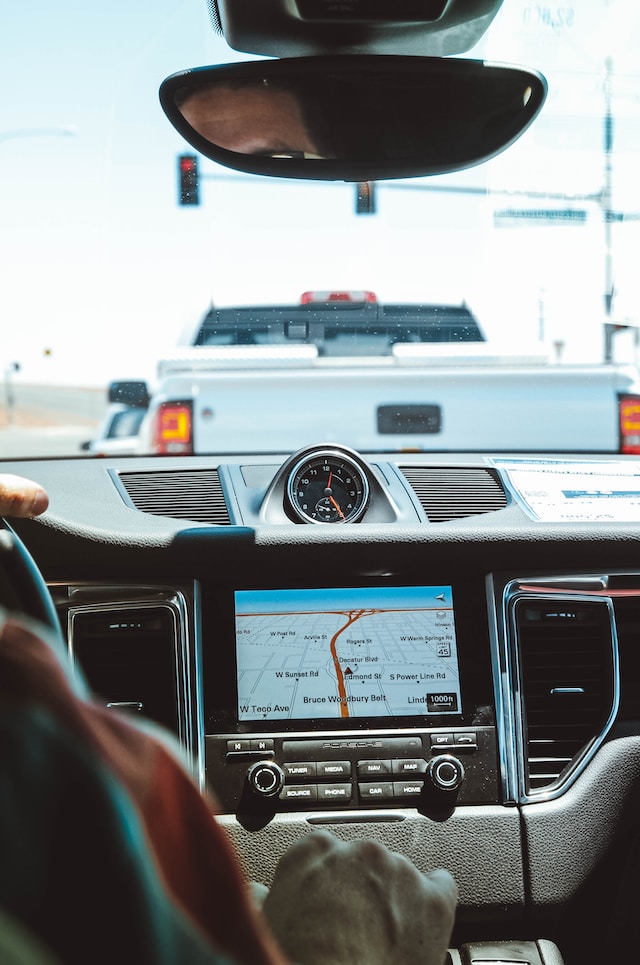 Driver inside a car with the GPS turned on