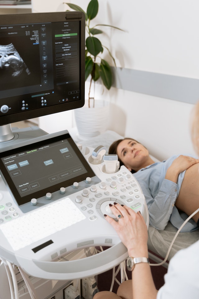 Healthcare professional performing an imaging procedure