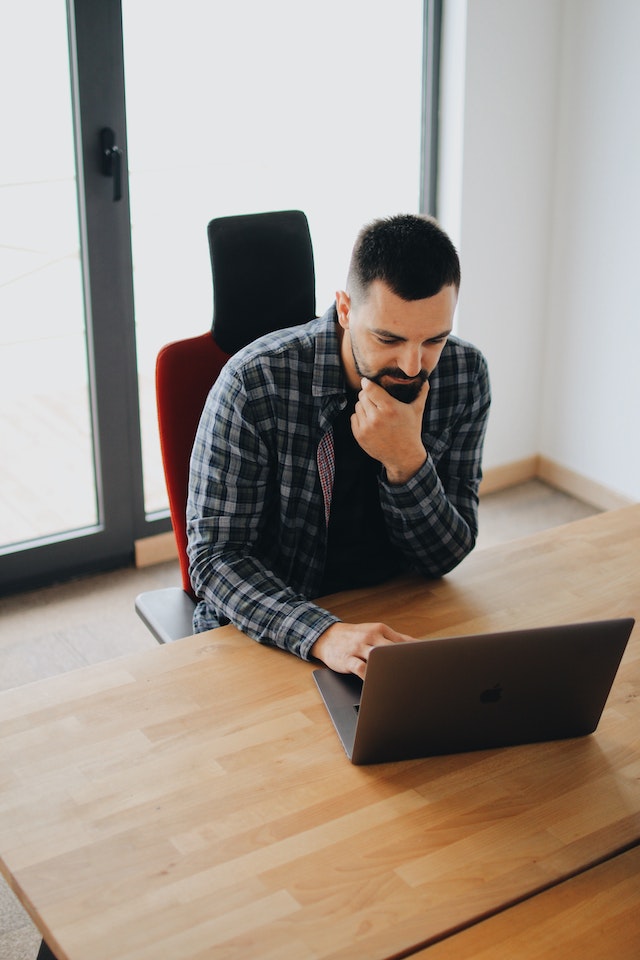 Person working on his laptop