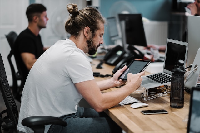 Person typing on a mobile device